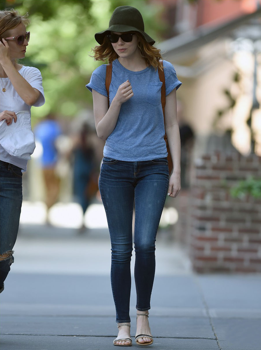 Emma Stone walks home from Cafe Cluny with a friend on a hot day in New York city