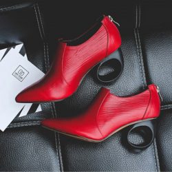Red boots trend street styles at fashion weeks | Chiko Shoes