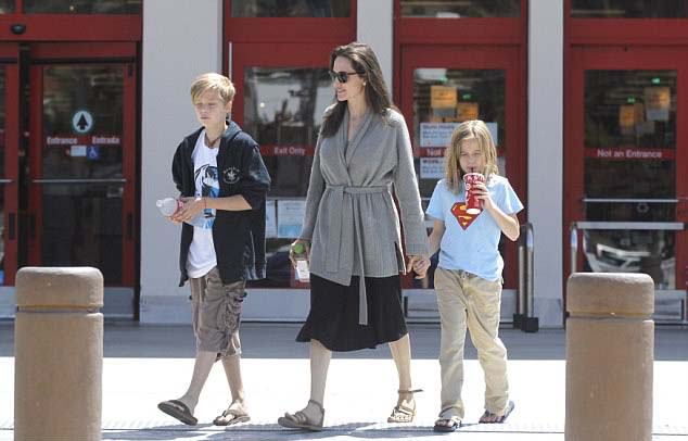 Angelina Jolie flat sandals shopping style